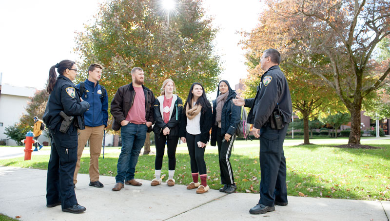 Image of Ony Sierra and James Mroczka meeting with students