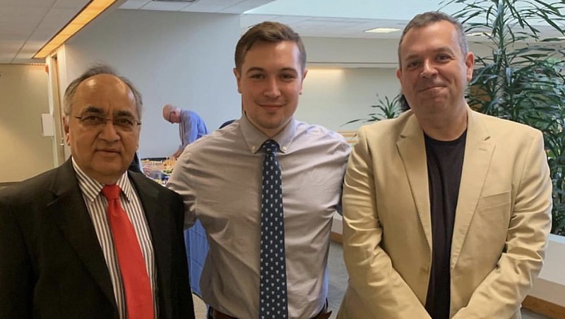 Kamal Upadhyaya, Ethan McGee, and Ethan’s father, Glenn McGee.