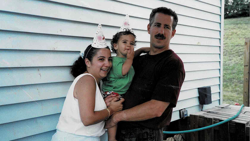 A young Max Giaccone '14 with his parents.