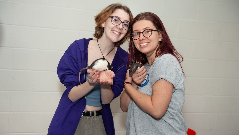 Sophia Gambale ’22 (right) and her Center for Wildlife Forensic Research colleagues introduced the University community to some of the lab’s animals.
