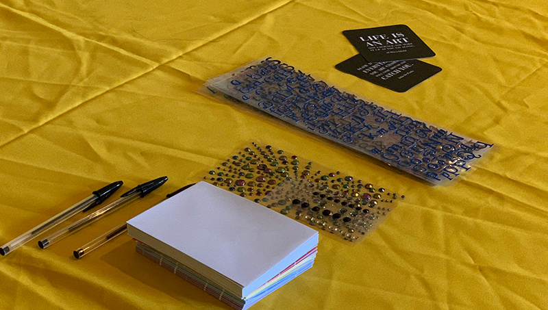 Stickers, sparkles, and stationery offered to students at the event. 