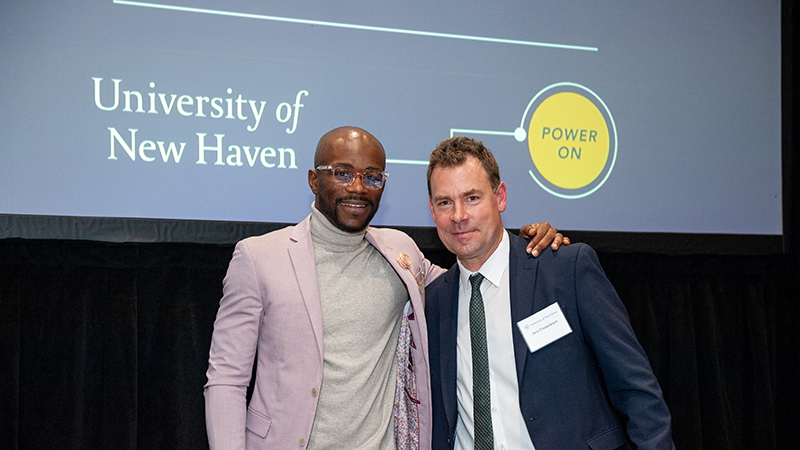 Marcus Harvin ’23 A.A., ’25, one of the inaugural graduates of the program, and University President-Elect Frederiksen, Ph.D.
