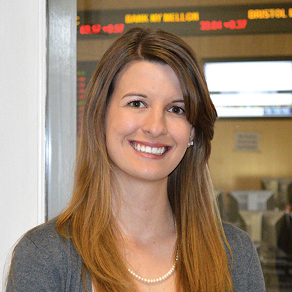 An image of smiling business management alumnus, Lauren Ritchie.